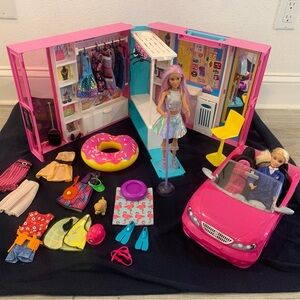 Barbie Bundle: Dream Closet Playset, Convertible, and assorted accessories.